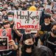 Protesters occupy the arrival hall of the Hong Kong International Airport during a demonstration on August 12, 2019 in Hong Kong, China